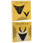Tanga noir en dentelle avec bijou losanges dorés